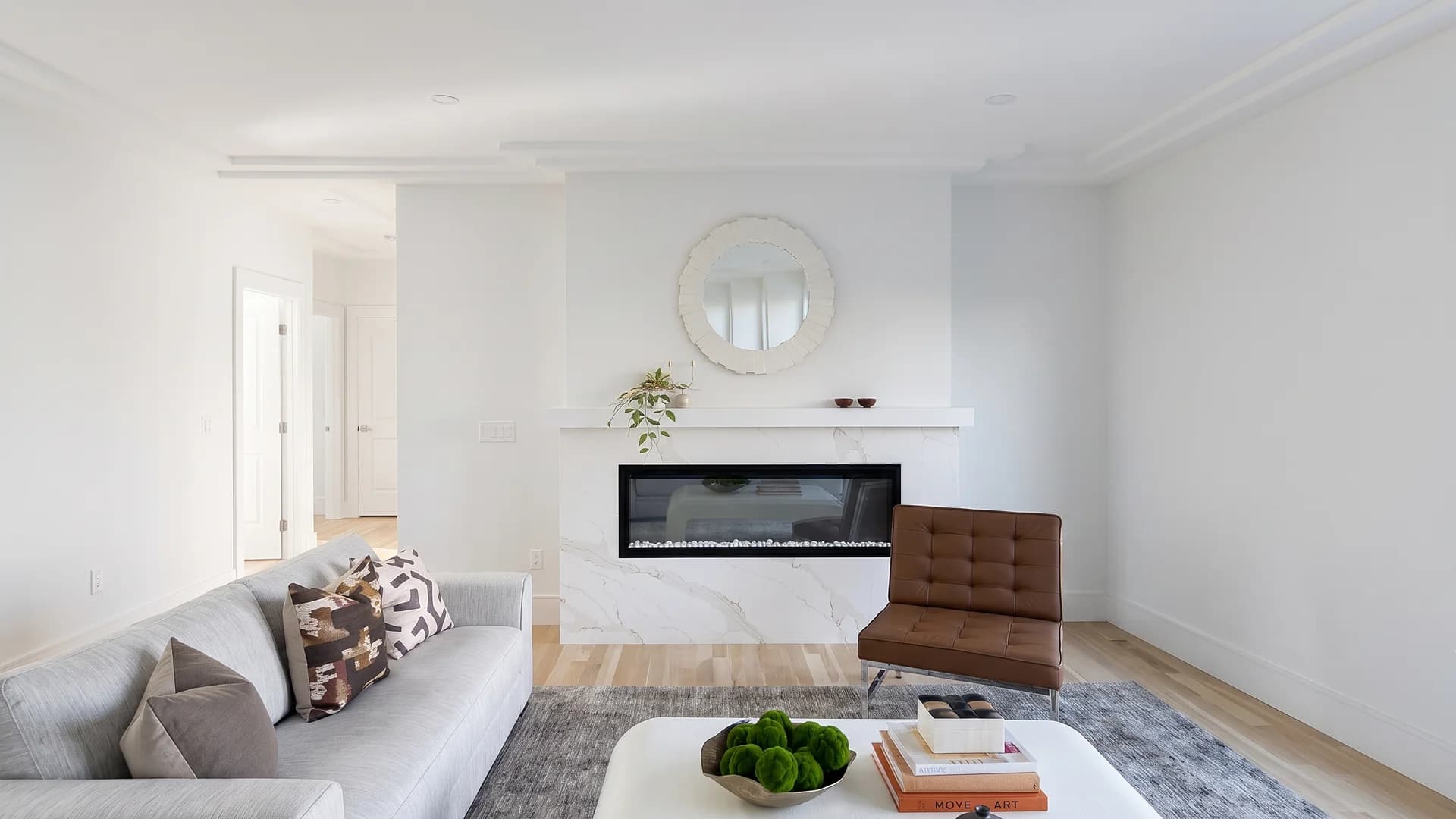 Living room with linear fireplace